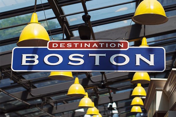 A sign in Boston that says Destination Boston