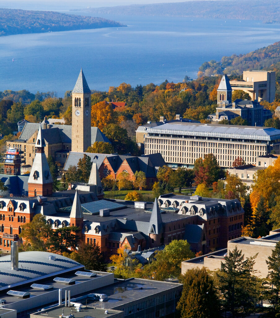 Aerial view of Cornell’s campus with a lake in the background.